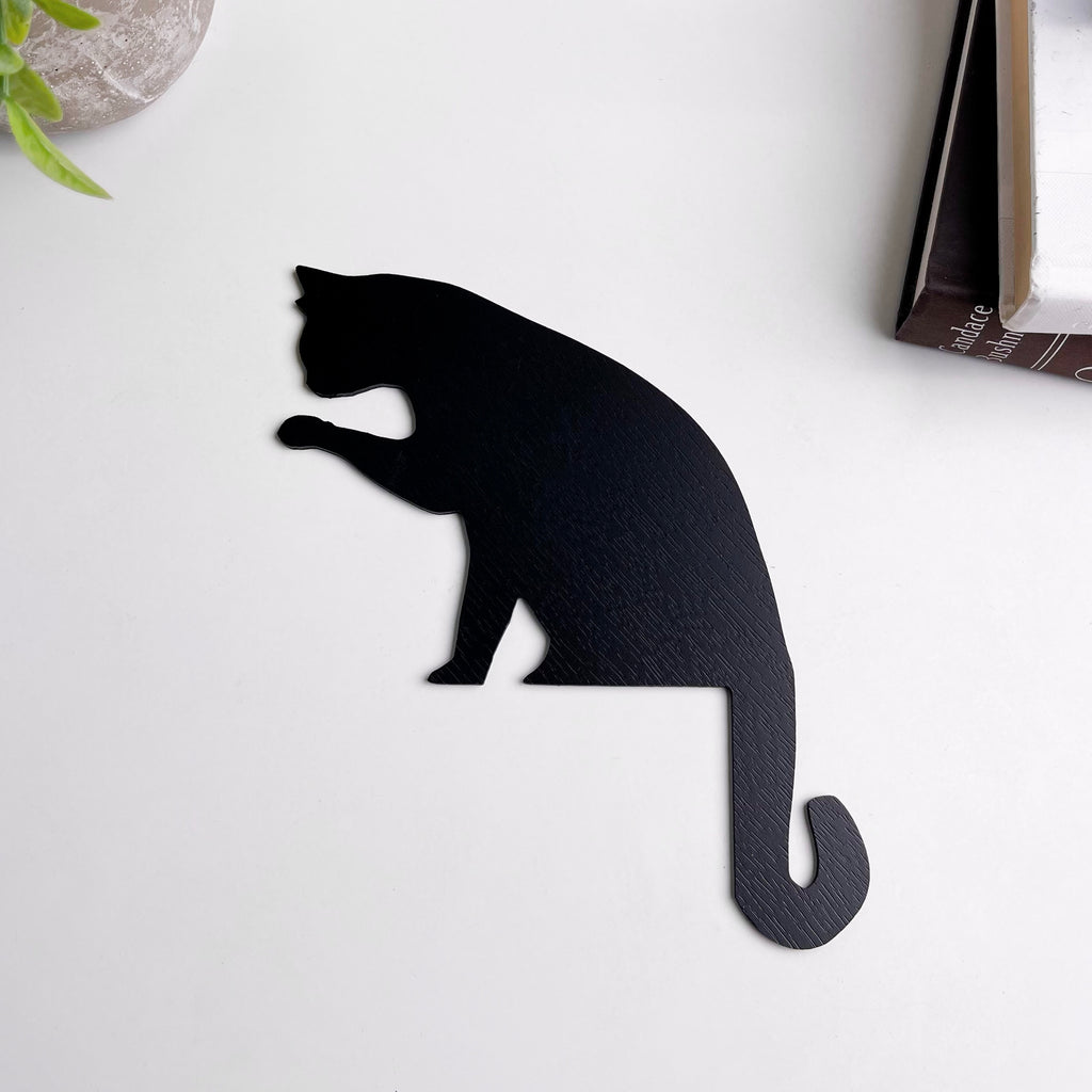 Cat Licking Paw Door Topper