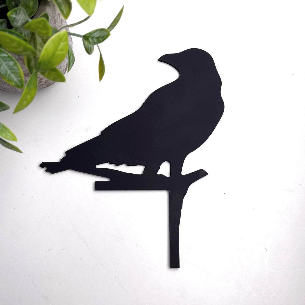 Head Turning Crow Door Topper
